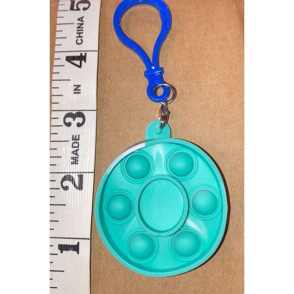 ☀️3/$12☀️ Letter “O” Pop it Fidget Toy Keychain - Picture 2 of 4
